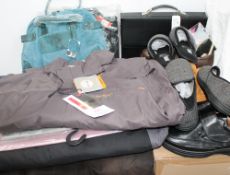 A briefcase, shoes, coats,