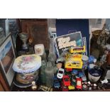 An extensive lot including Esso collection badges, collectors' plates, toy cars, pin badges,