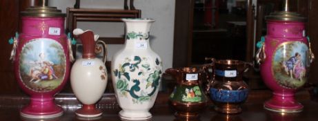 A pair of 19th century continental porcelain vases painted with figures in landscapes together with