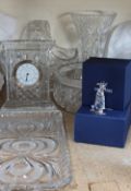 A Swarovski crystal golf bag together with a Waterford crystal clock,