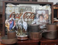 A 20th century Coca Cola mirror together with a resin Capodimonte table lamp,