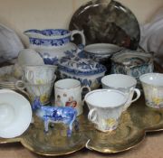 A Lawleys daffodil decorated part tea set, together with a blue and white sauce tureen and cover,