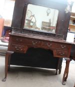 An early 20th century mahogany dressing table and a pair of white painted candle stands