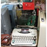 An Olympia splendid 66 typewriter together with tools,