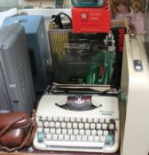 An Olympia splendid 66 typewriter together with tools,