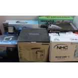 A collection of new and used boxed appliances including a pest control zapper,
