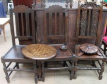A pair of 17th century style oak dining chairs together with another oak dining chair and a chess