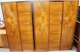 A 20th century Austinsuite walnut bedroom suite comprising two wardrobes, double bed,