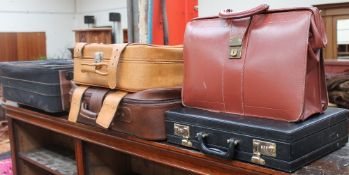 A briefcase together with suitcases etc