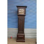 A Warings and Gillows oak long case clock,
