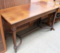 A 19th century mahogany centre table on square tapering legs