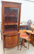 An Edwardian mahogany display cabinet together with a tripod table,