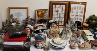 Royal Doulton character jugs together with Capodimonte figures, framed cigarette cards, decanters,