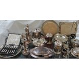 Assorted electroplated wares including candlesticks, entree dishes and covers,
