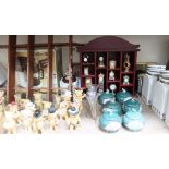 A large lot including a collection of pottery teddy bears, miniature clock collection, storage jars,