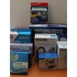 A collection of new and used boxed appliances including a Seal Multimedia Centre,