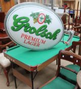 A Grolsh advertising sign together with a pool table etc