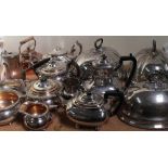 A collection of electroplated wares including dish covers, part tea service,