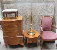 A 20th century burr walnut chest of drawers together with a walnut work table with a circular top,