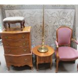 A 20th century burr walnut chest of drawers together with a walnut work table with a circular top,