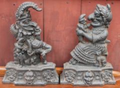 A pair of cast iron door stops in the form of Punch and Judy