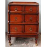 A reproduction mahogany waterfall chest of drawers