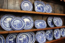 A Spode blue and white willow pattern pottery part dinner service, comprising bowls,