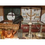 A wicker picnic basket with copper brass and tin plate fittings,