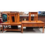 A modern yew coffee table together with another coffee table with drawers,