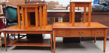 A modern yew coffee table together with another coffee table with drawers,