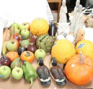 A large collection of Penkridge pottery fruit and vegetables together with pottery figures etc