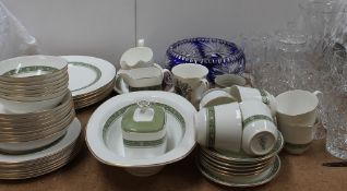 A Royal Doulton Rondelay pattern part tea and dinner service together with crystal drinking glasses