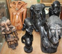 A collection of African carved figures