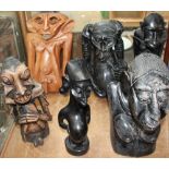 A collection of African carved figures