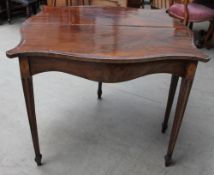 A 19th century mahogany tea table