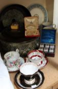 A Celtic pottery dish and ceiling lamp together with cups and saucers, electroplated napkin rings,
