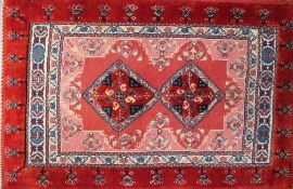 A red ground wall hanging