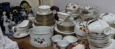 A collection of Blue and black Ewenny pottery jugs and vases together with a Royal Worcester