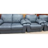 A blue leather upholstered three-piece suite
