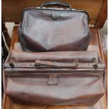 Two brown leather doctors type bags