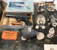 John Hughes pottery animals together with a Webley Mark 1 pistol