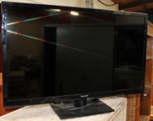 A Panasonic 32" flat screen television (sold as seen,
