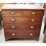 A George III mahogany chest with a rectangular top,