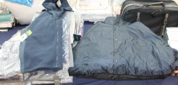 Assorted men's clothing including jackets, jumpers,