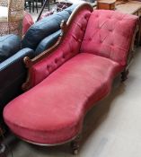 A Victorian upholstered scroll over arm chaise longue