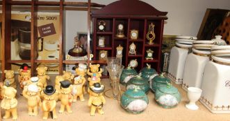 A large lot including a collection of pottery teddy bears, miniature clock collection, storage jars,
