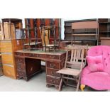 A reproduction mahogany desk together with a filing cabinet, a pair of folding chairs,