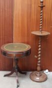 A standard lamp with a barley twist column together with a reproduction drum table