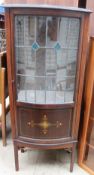 An Edwardian mahogany display cabinet together with a teak display cabinet