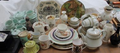 A pottery part tea service together with commemorative mugs, Noritake part tea service,